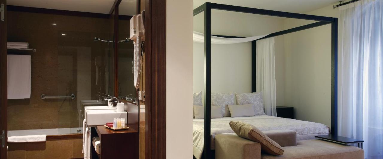 Hotel Palacio De Meras Тинео Экстерьер фото